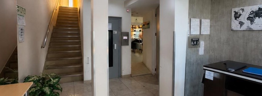 Hall de ingreso y ascensor